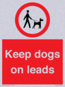 dogs-on-lead-symbol-with-black-text-on-white-background~
